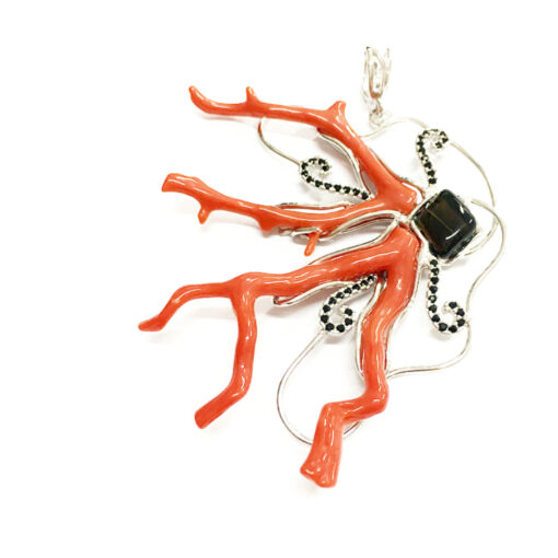 Silver-mounted coral with smoked quartz