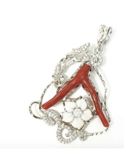 Coral pendant mounted on gold or silver and zircons