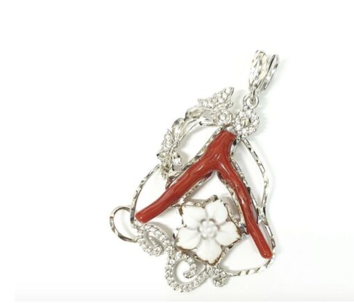 Coral pendant mounted on gold or silver and zircons