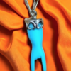 Lucky charm in the shape of a hand 'making horns', turquoise paste horns, turquoise amulet, lucky gift ,turquoise hand